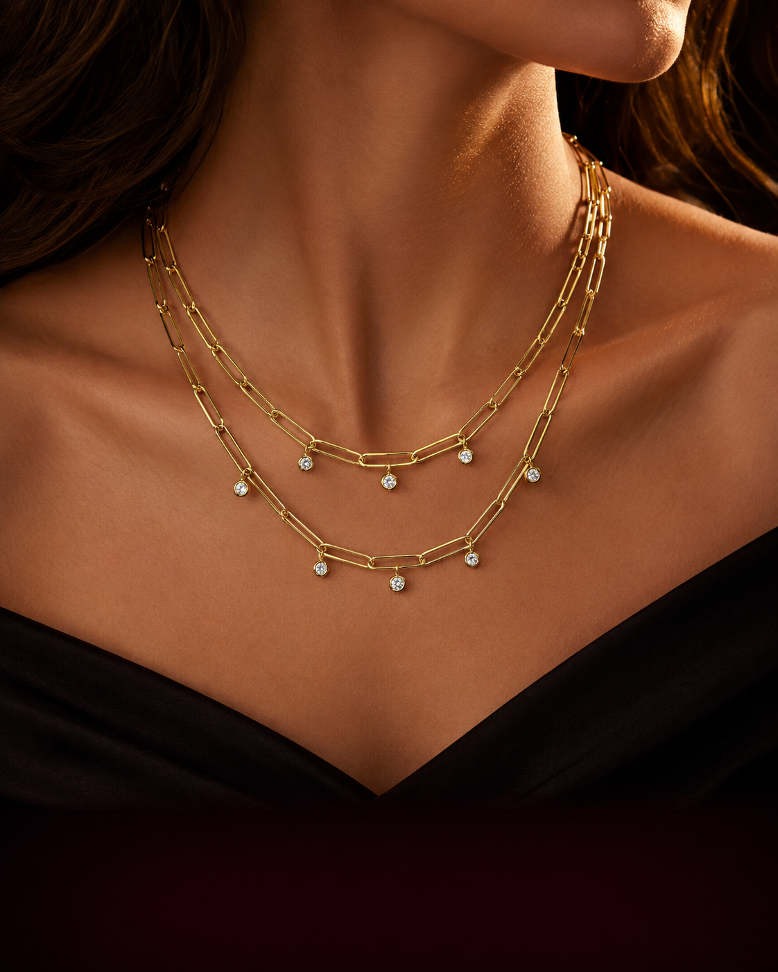 Alicenne gold necklace worn on model